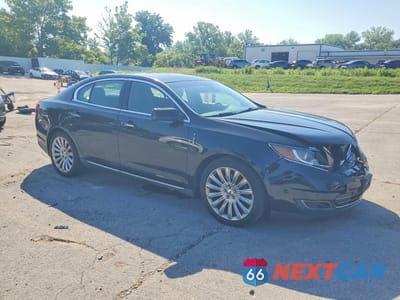Czwarte zdjęcie samochodu z boku: 2013 LINCOLN MKS VIN:1LNHL9EK7DG604582 - miniatura