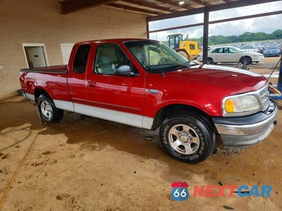 Czwarte zdjęcie samochodu z boku: 2003 FORD F150 VIN:2FTRX172X3CB03231 - miniatura