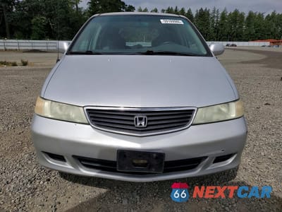 Piąte zdjęcie samochodu w środku: 2001 HONDA ODYSSEY EX VIN:2HKRL18601H607369 - miniatura