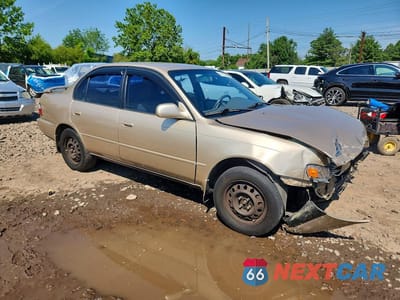 Czwarte zdjęcie samochodu z boku: 1997 TOYOTA COROLLA DX VIN:2T1BB02E7VC193935 - miniatura
