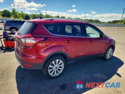 Trzecie zdjęcie samochodu z tyłu: 2018 FORD ESCAPE TITANIUM VIN:1FMCU0J95JUA04792 - miniatura