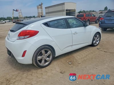 Trzecie zdjęcie samochodu z tyłu: 2014 HYUNDAI VELOSTER BASE VIN:KMHTC6AD6EU191914 - miniatura