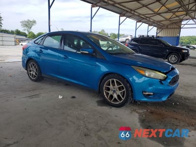 Czwarte zdjęcie samochodu z boku: 2015 FORD FOCUS SE VIN:1FADP3F23FL247159 - miniatura