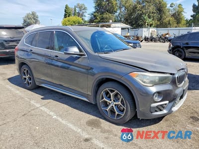 Czwarte zdjęcie samochodu z boku: 2019 BMW X1 XDRIVE28I VIN:WBXHT3C59K5L89166 - miniatura