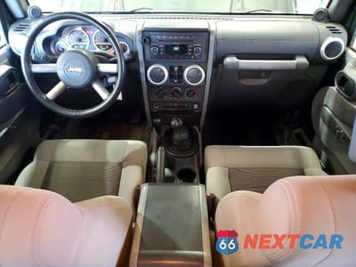 Zdjęcie 8 z 13 samochodu: 2010 JEEP WRANGLER UNLIMITED SAHARA VIN:1J4BA5H17AL167899 - miniatura