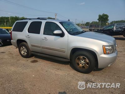 Czwarte zdjęcie samochodu z boku: 2012 CHEVROLET TAHOE C1500 LT VIN:1GNSCBE0XCR192104 - miniatura