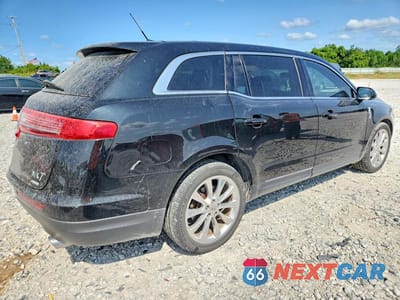 Trzecie zdjęcie samochodu z tyłu: 2012 LINCOLN MKT VIN:2LMHJ5AT0CBL52715 - miniatura