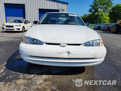 Piąte zdjęcie samochodu w środku: 2000 CHEVROLET GEO PRIZM BASE VIN:1Y1SK5282YZ422079 - miniatura