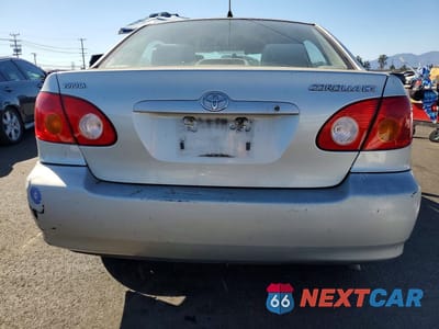 Zdjęcie 6 z 12 samochodu: 2003 TOYOTA COROLLA CE VIN:1NXBR32E23Z142710 - miniatura