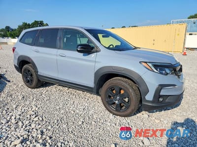 Czwarte zdjęcie samochodu z boku: 2022 HONDA PILOT TRAILSPORT VIN:5FNYF6H81NB102236 - miniatura