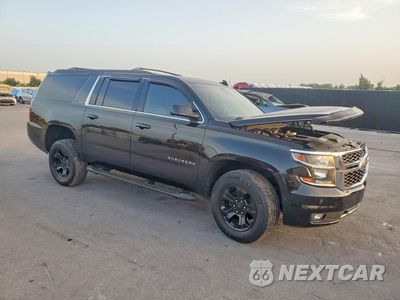 Czwarte zdjęcie samochodu z boku: 2018 CHEVROLET SUBURBAN K1500 LT VIN:1GNSKHKC4JR293334 - miniatura