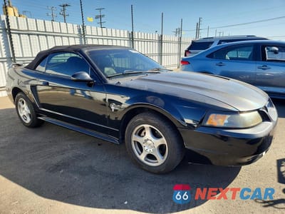 Czwarte zdjęcie samochodu z boku: 2003 FORD MUSTANG VIN:1FAFP44473F416967 - miniatura