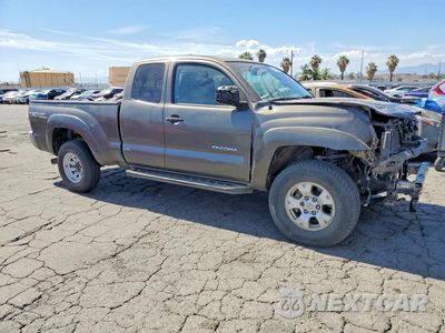 Czwarte zdjęcie samochodu z boku: 2014 TOYOTA TACOMA V6 VIN:5TFUU4EN2EX105106 - miniatura