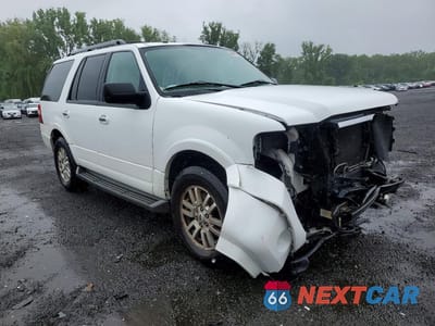 Czwarte zdjęcie samochodu z boku: 2011 FORD EXPEDITION XLT VIN:1FMJU1J58BEF43932 - miniatura