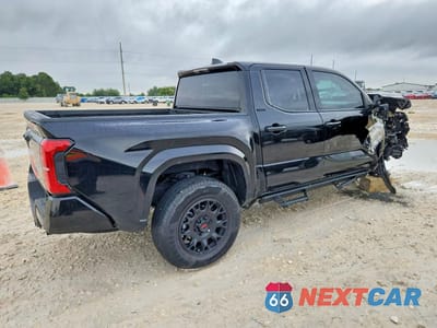Trzecie zdjęcie samochodu z tyłu: 2025 TOYOTA TACOMA SR5 VIN:3TMLB5JN4SM193414 - miniatura