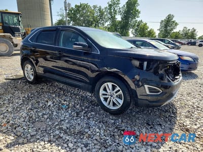 Czwarte zdjęcie samochodu z boku: 2018 FORD EDGE SEL VIN:2FMPK4J84JBB12641 - miniatura