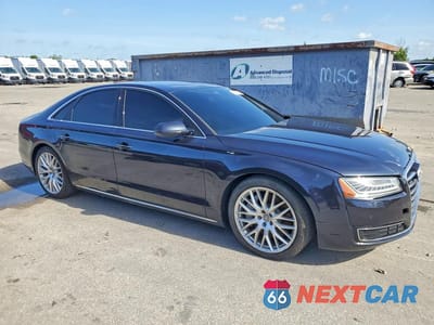 Czwarte zdjęcie samochodu z boku: 2015 AUDI A8 QUATTRO VIN:WAUJ2AFD5FN034085 - miniatura