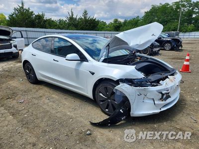 Czwarte zdjęcie samochodu z boku: 2026 TESLA MODEL 3 VIN:5YJ3E1EB2TF121214 - miniatura
