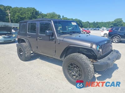 Czwarte zdjęcie samochodu z boku: 2016 JEEP WRANGLER UNLIMITED SPORT VIN:1C4BJWDG3GL256044 - miniatura