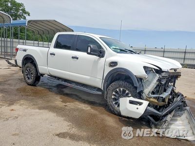 Czwarte zdjęcie samochodu z boku: 2023 NISSAN TITAN XD PRO-4X VIN:1N6AA1FB5PN112495 - miniatura
