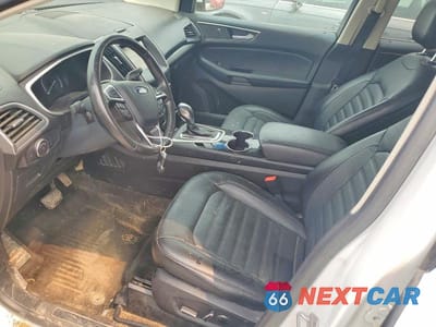 Zdjęcie 7 z 13 samochodu: 2015 FORD EDGE SEL VIN:2FMTK4J98FBB00779 - miniatura
