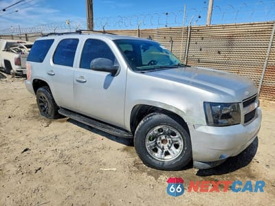 Czwarte zdjęcie samochodu z boku: 2011 CHEVROLET TAHOE C1500 LT VIN:1GNSCBE00BR111724 - miniatura