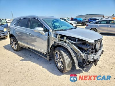 Czwarte zdjęcie samochodu z boku: 2024 CADILLAC XT5 PREMIUM LUXURY VIN:1GYKNCRS1RZ744323 - miniatura