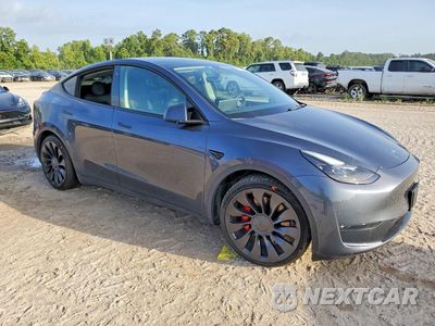 Czwarte zdjęcie samochodu z boku: 2022 TESLA MODEL Y VIN:7SAYGDEF9NF461955 - miniatura