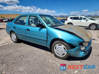 Czwarte zdjęcie samochodu z boku: 1999 TOYOTA COROLLA VE VIN:1NXBR12E7XZ262948 - miniatura