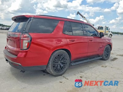 Trzecie zdjęcie samochodu z tyłu: 2022 CHEVROLET TAHOE K1500 Z71 VIN:1GNSKPKD1NR140015 - miniatura