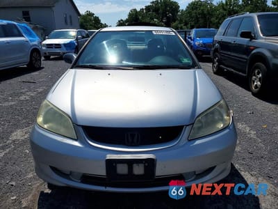 Piąte zdjęcie samochodu w środku: 2005 HONDA CIVIC DX VP VIN:1HGEM22115L080315 - miniatura