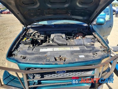 Zdjęcie 11 z 12 samochodu: 1997 FORD F-150 VIN:1FTDX1868VKA48286 - miniatura