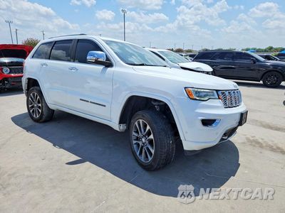 Czwarte zdjęcie samochodu z boku: 2018 JEEP GRAND CHEROKEE OVERLAND VIN:1C4RJFCT9JC198817 - miniatura