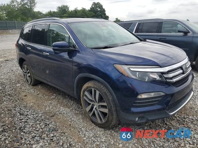 Czwarte zdjęcie samochodu z boku: 2017 HONDA PILOT TOURING VIN:5FNYF6H90HB066388 - miniatura