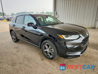 Czwarte zdjęcie samochodu z boku: 2023 HONDA HR-V EXL VIN:3CZRZ2H79PM718769 - miniatura