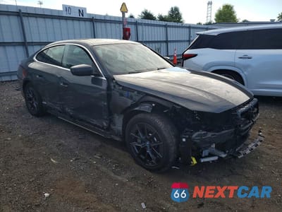 Czwarte zdjęcie samochodu z boku: 2024 BMW I4 EDRIVE 35 VIN:WBY43AW00RFR71126 - miniatura
