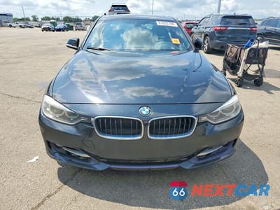 Piąte zdjęcie samochodu w środku: 2013 BMW 335 XI VIN:WBA3B9C55DF585466 - miniatura