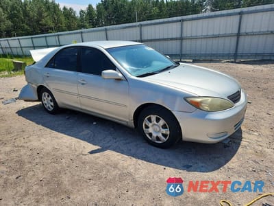 Czwarte zdjęcie samochodu z boku: 2002 TOYOTA CAMRY LE VIN:4T1BE32K82U008459 - miniatura