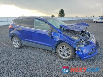 Czwarte zdjęcie samochodu z boku: 2014 FORD ESCAPE TITANIUM VIN:1FMCU9J93EUD60717 - miniatura