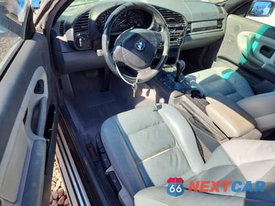 Zdjęcie 8 z 12 samochodu: 1999 BMW 323 IC AUTOMATIC VIN:WBABJ8332XEM24381 - miniatura