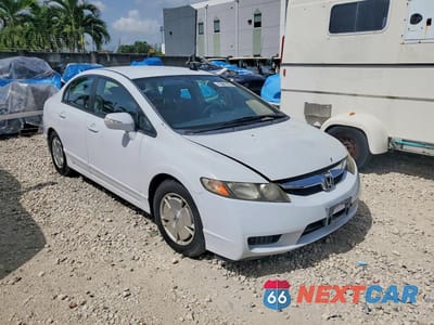 Czwarte zdjęcie samochodu z boku: 2011 HONDA CIVIC HYBRID VIN:JHMFA3F25BS000129 - miniatura