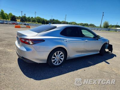 Trzecie zdjęcie samochodu z tyłu: 2021 TOYOTA CAMRY LE VIN:4T1C11AK4MU591704 - miniatura