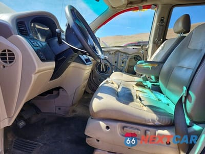 Zdjęcie 7 z 13 samochodu: 2002 HONDA ODYSSEY EXL VIN:2HKRL189X2H575283 - miniatura
