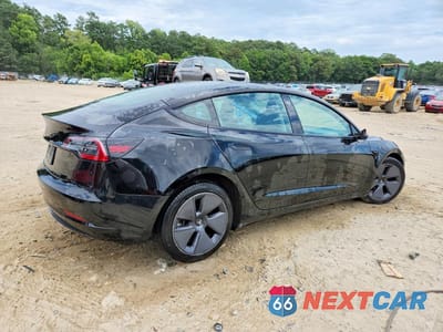Trzecie zdjęcie samochodu z tyłu: 2022 TESLA MODEL 3 VIN:5YJ3E1EAXNF370905 - miniatura