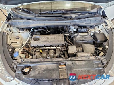 Zdjęcie 12 z 13 samochodu: 2012 HYUNDAI TUCSON LIMITED VIN:KM8JUCAC7CU543924 - miniatura