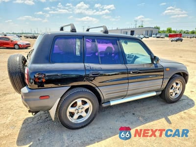 Trzecie zdjęcie samochodu z tyłu: 1997 TOYOTA RAV4 BASE VIN:JT3GP10V0V0013449 - miniatura