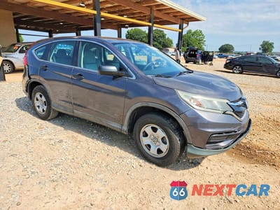 Czwarte zdjęcie samochodu z boku: 2016 HONDA CR-V LX VIN:3CZRM3H32GG707029 - miniatura