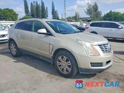 Czwarte zdjęcie samochodu z boku: 2015 CADILLAC SRX VIN:3GYFNAE32FS524959 - miniatura