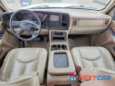 Zdjęcie 8 z 12 samochodu: 2004 GMC YUKON VIN:1GKEK13T54J175263 - miniatura