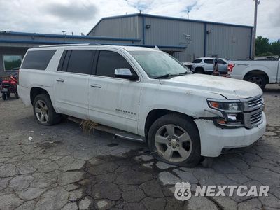 Czwarte zdjęcie samochodu z boku: 2017 CHEVROLET SUBURBAN K1500 PREMIER VIN:1GNSKJKC5HR205361 - miniatura